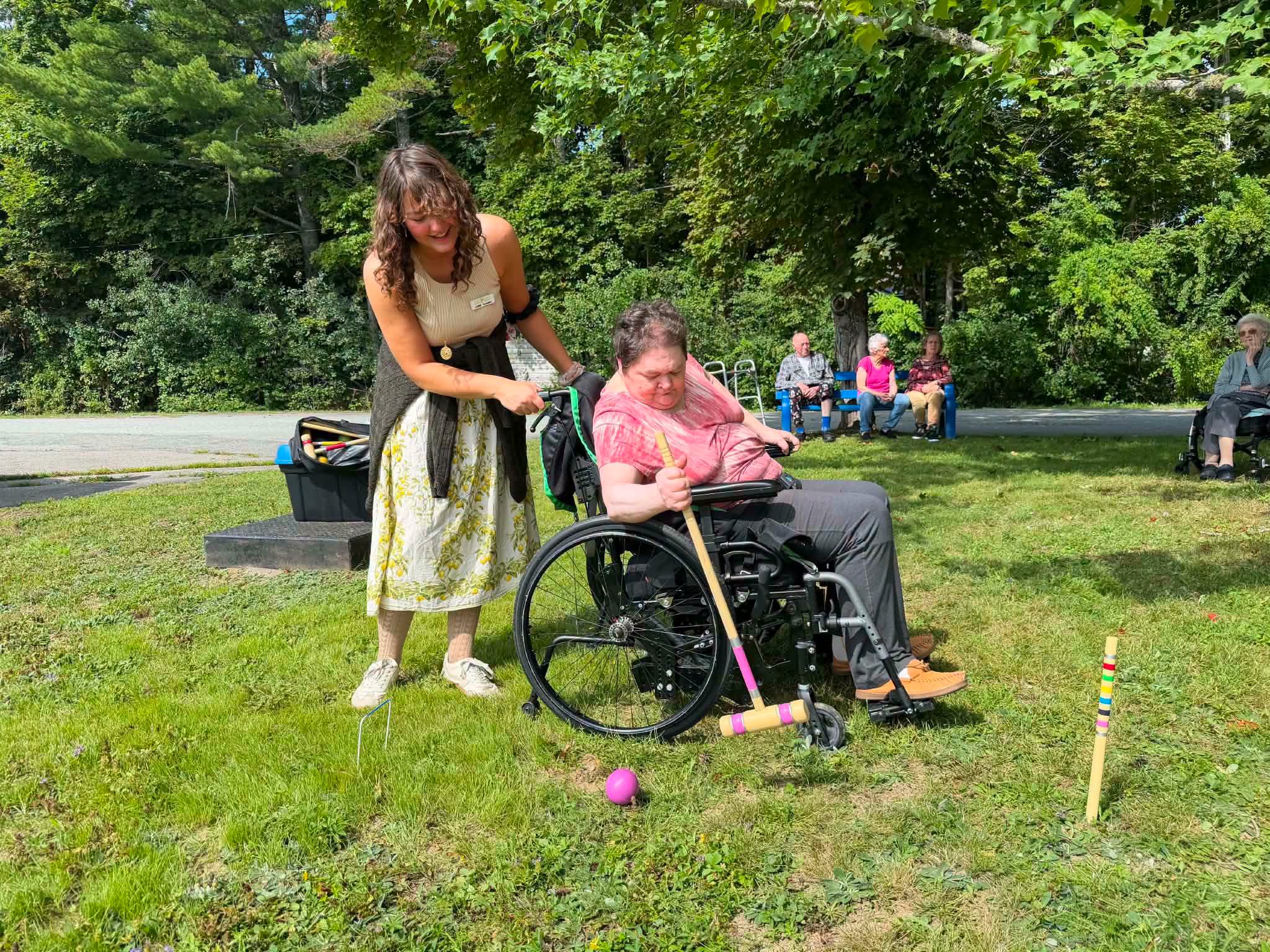 A North Queens staff member with a resident