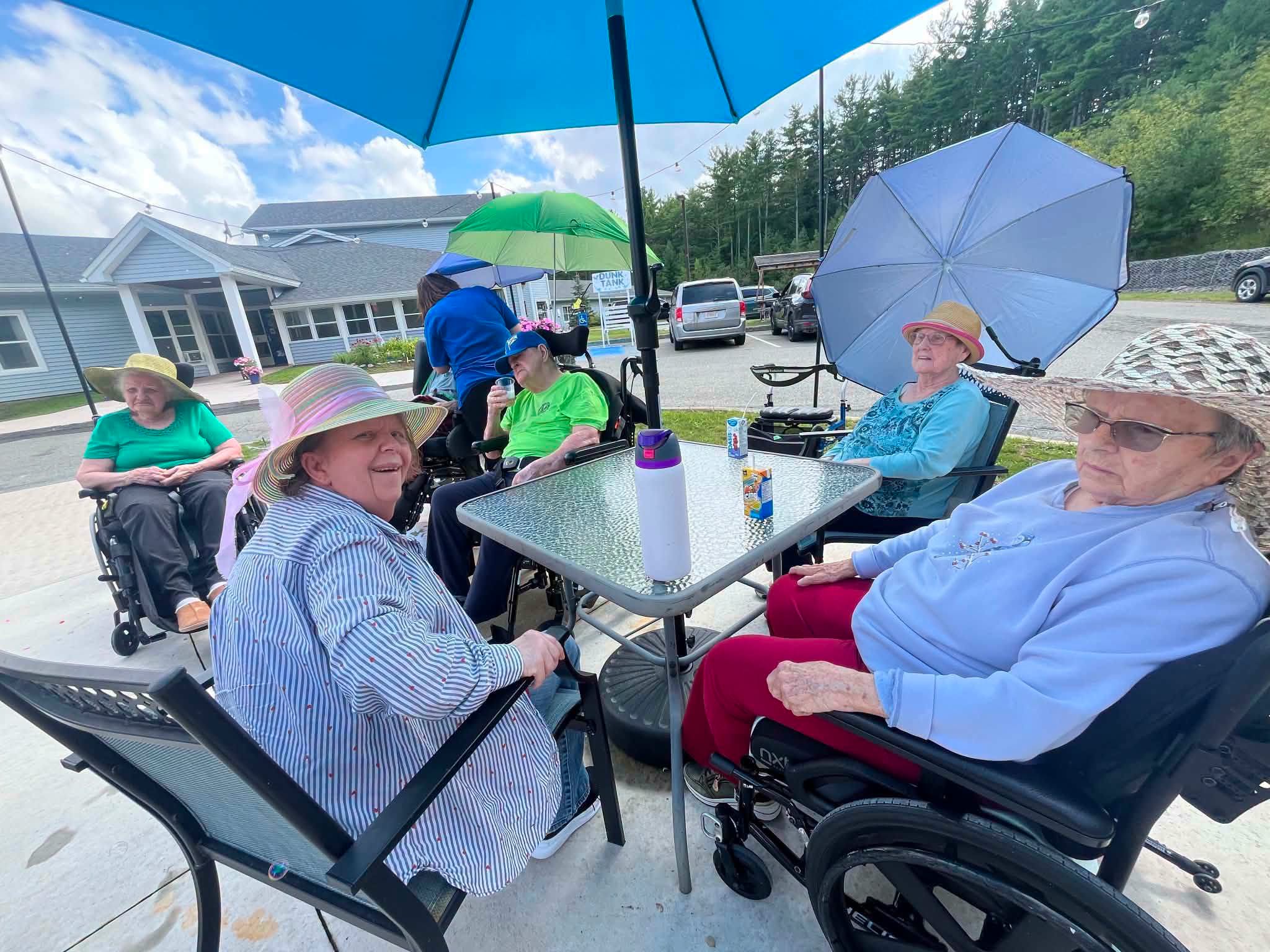 Outdoor patio gathering with umbrellas